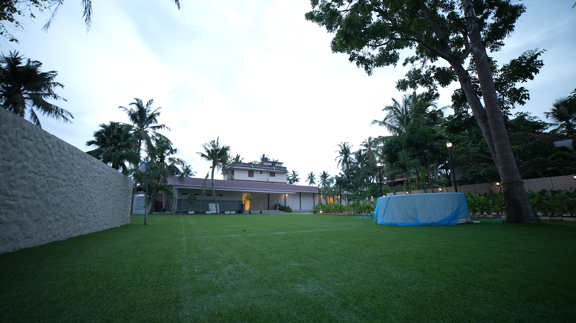 Aerial view of Kannur Gardens wedding venue with landscaped lawns and traditional Kerala architecture
